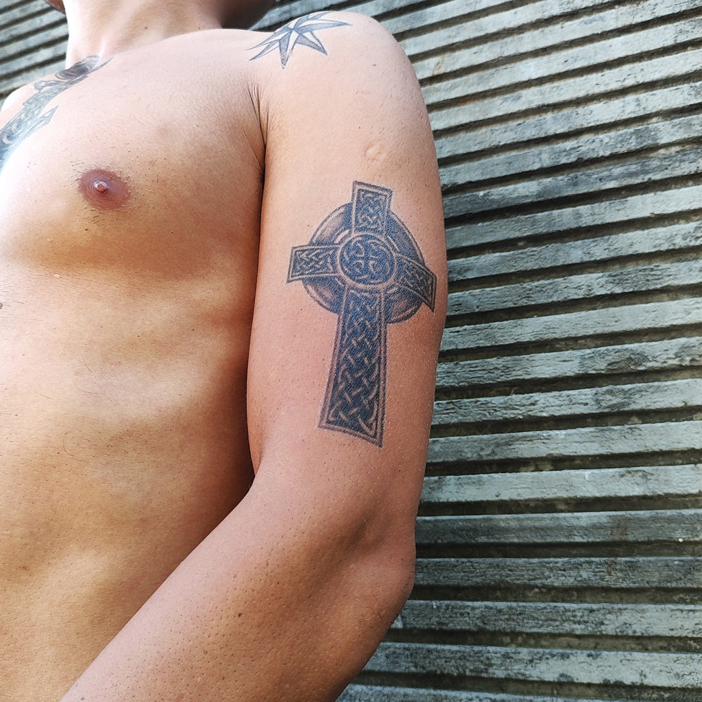 cross forearm tattoos