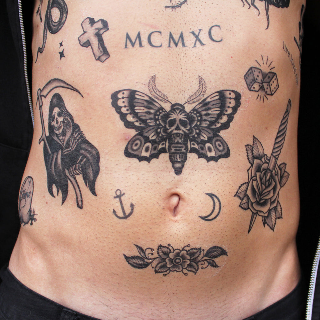skull moth tattoo
