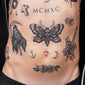 skull moth tattoo
