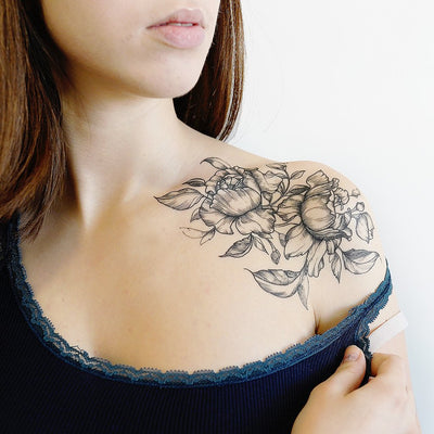flower tattoo collarbone