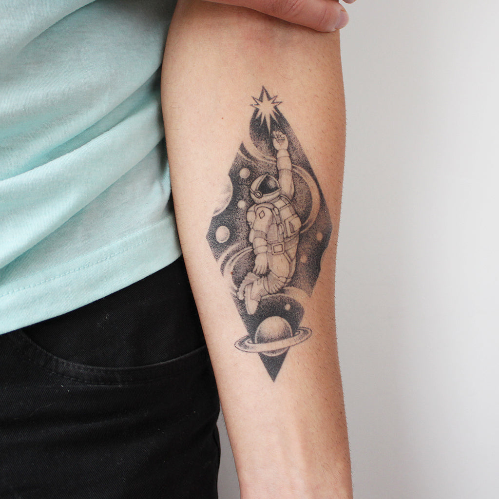 spaceman tattoo