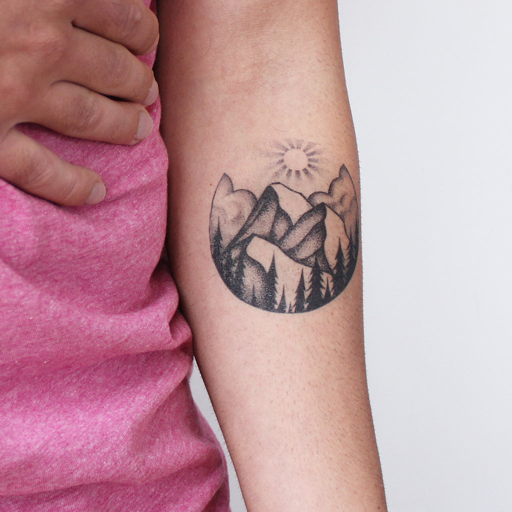 mountain circular tattoo