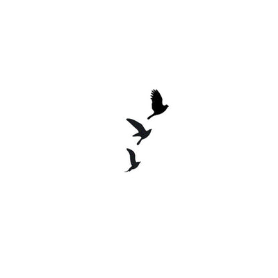 Tiny Flying Birds Tattoo
