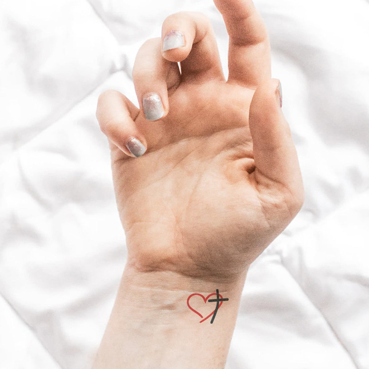 cross heart wrist tattoos