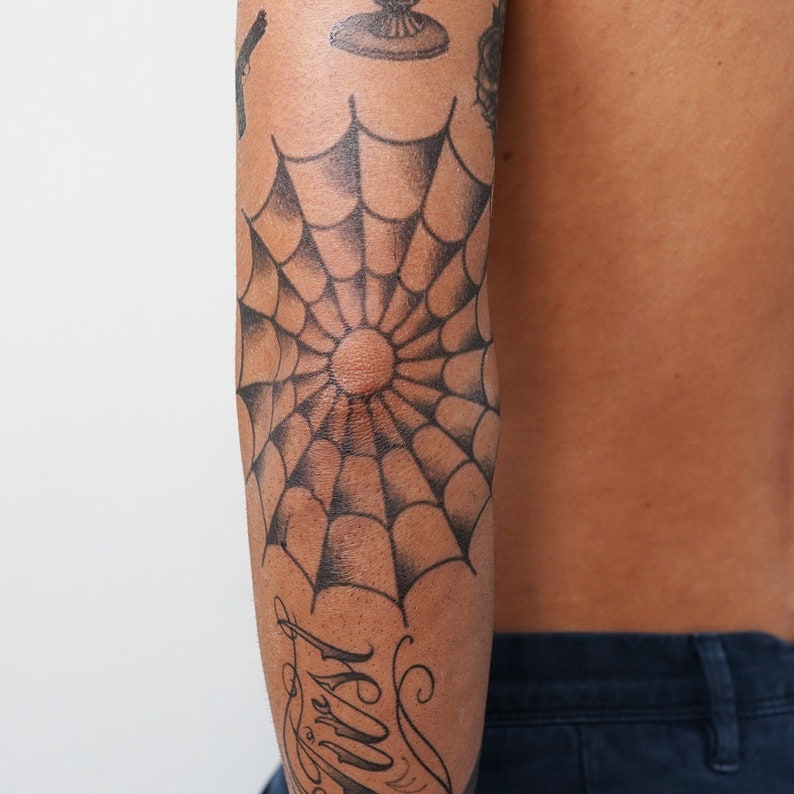 Spider Web Elbow Tattoo