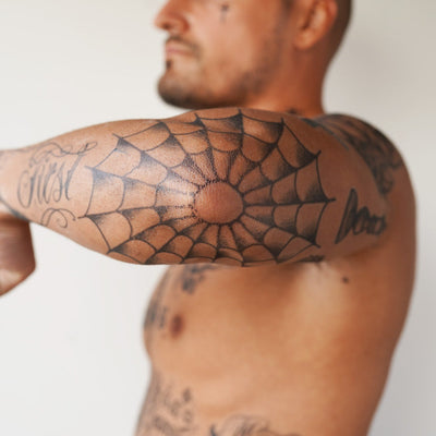 Spider Web Elbow Tattoo