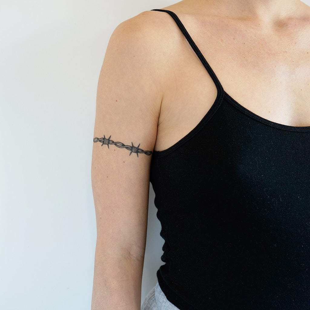 barbed wire cross tattoo