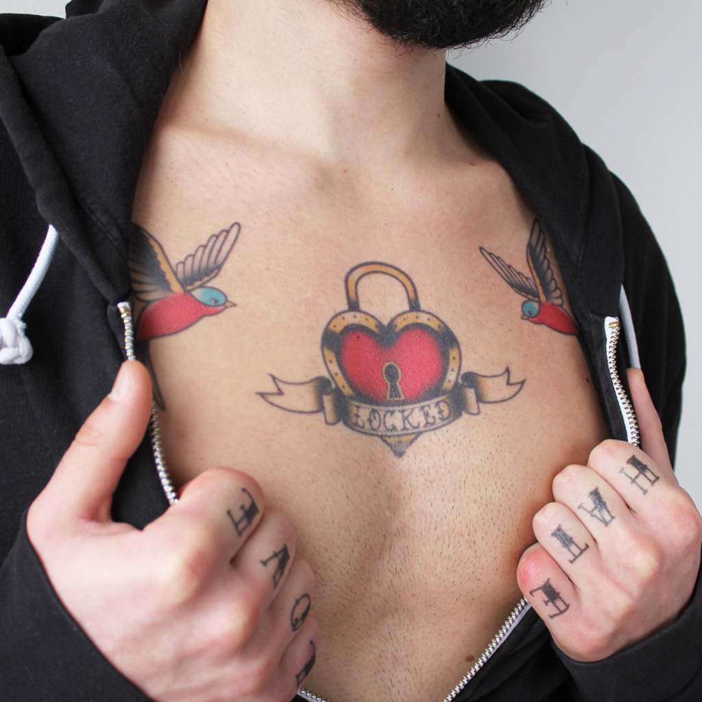 lock tattoo on chest