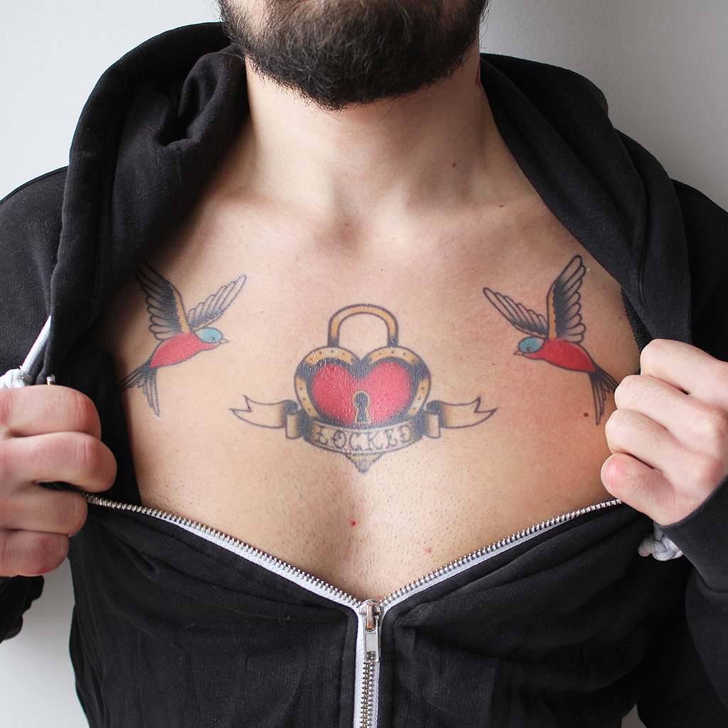 lock tattoo on chest