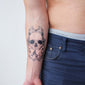skull forearm tattoo