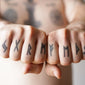 runes knuckle tattoo
