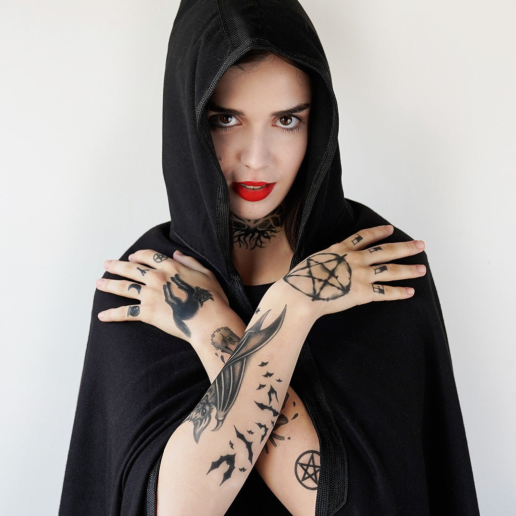 hanging bat tattoo witch