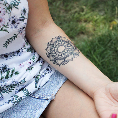 beautiful flower mandala tattoo forearm