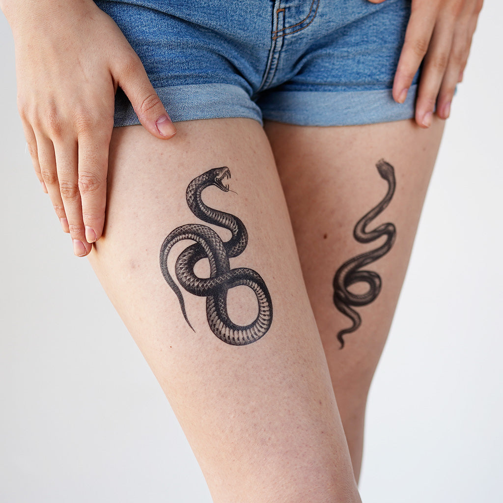 serpent leg tattoo