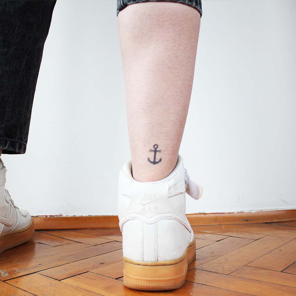 small anchor tattoo girl