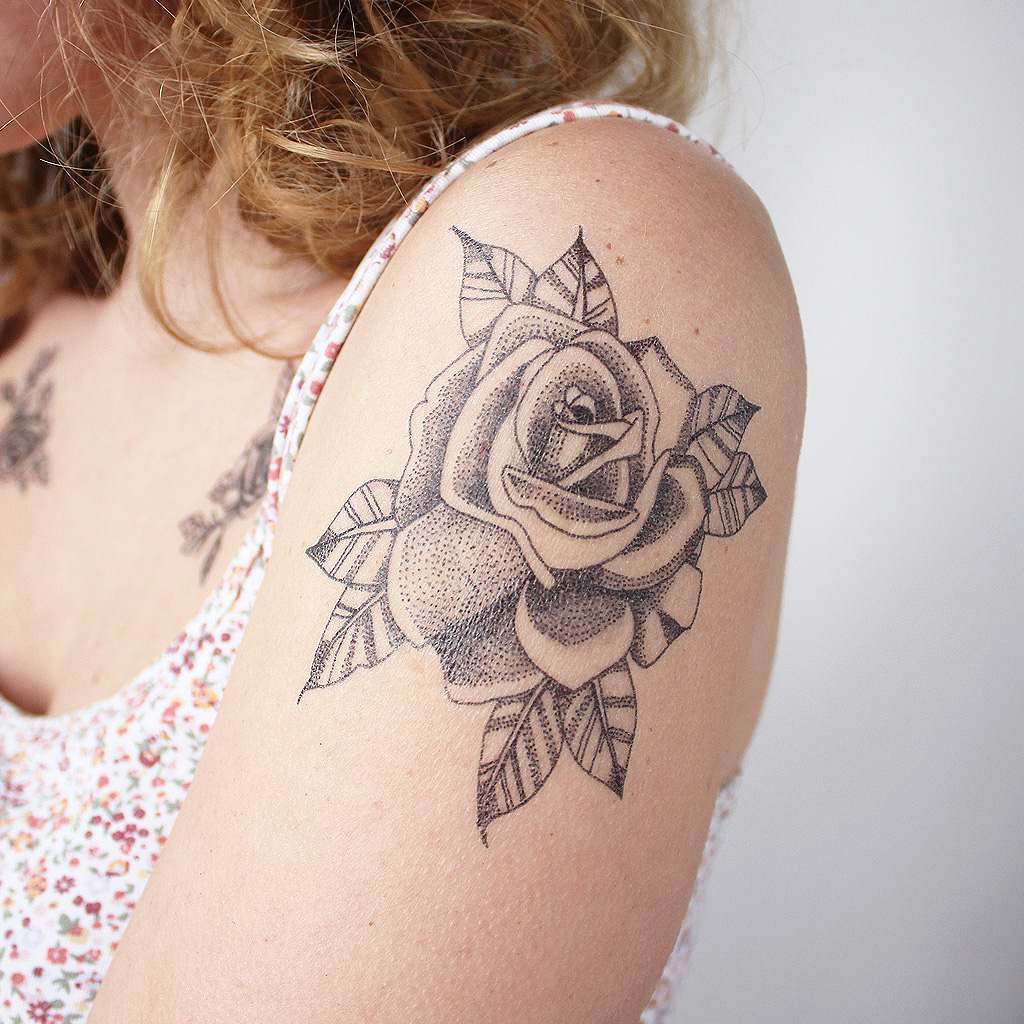 rose linework tattoo