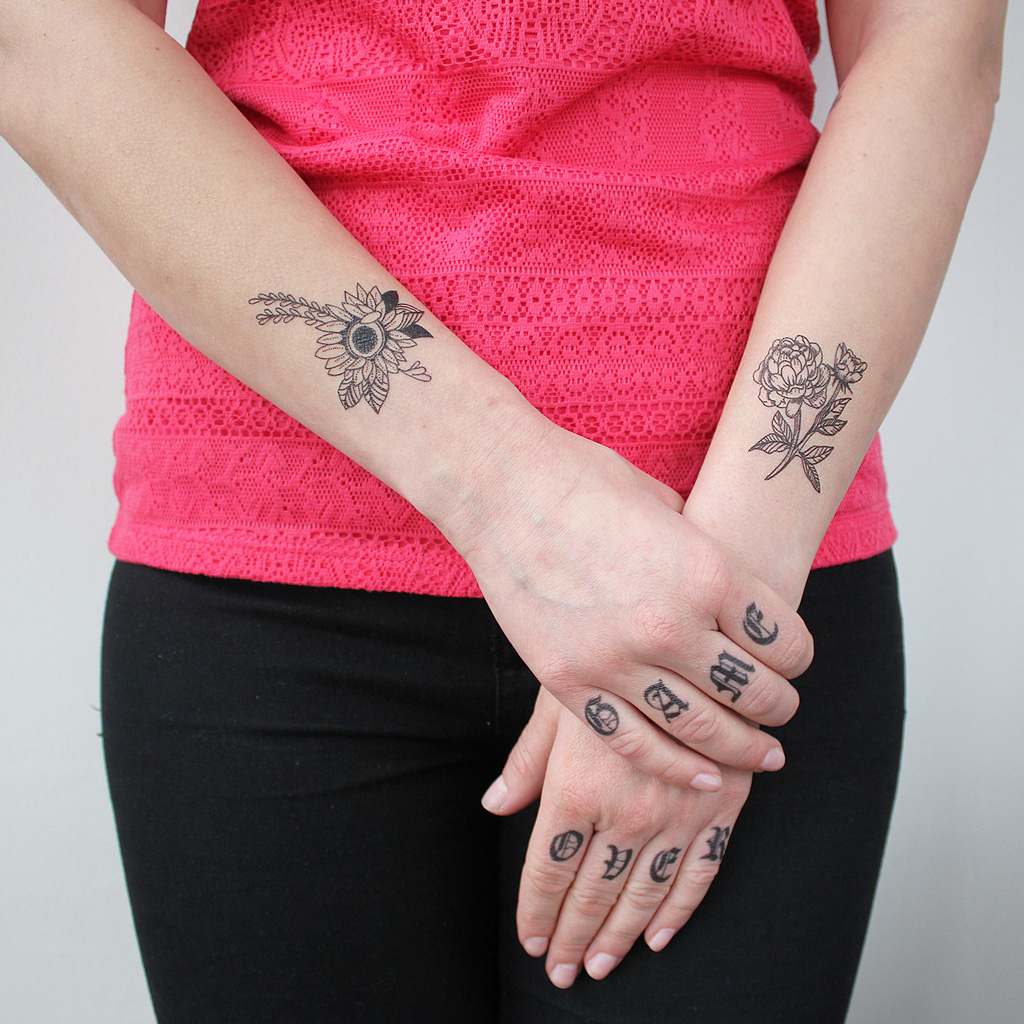 girl with temporary knuckle tattoos