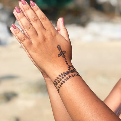rosary tattoo praying hands