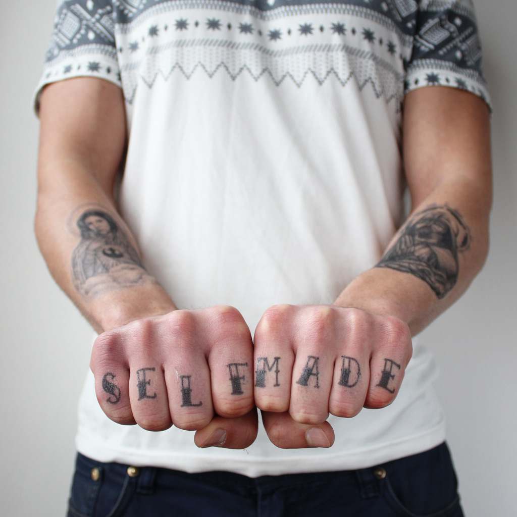 thug life tattoo on knuckles
