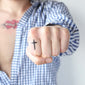 cross finger tattoo