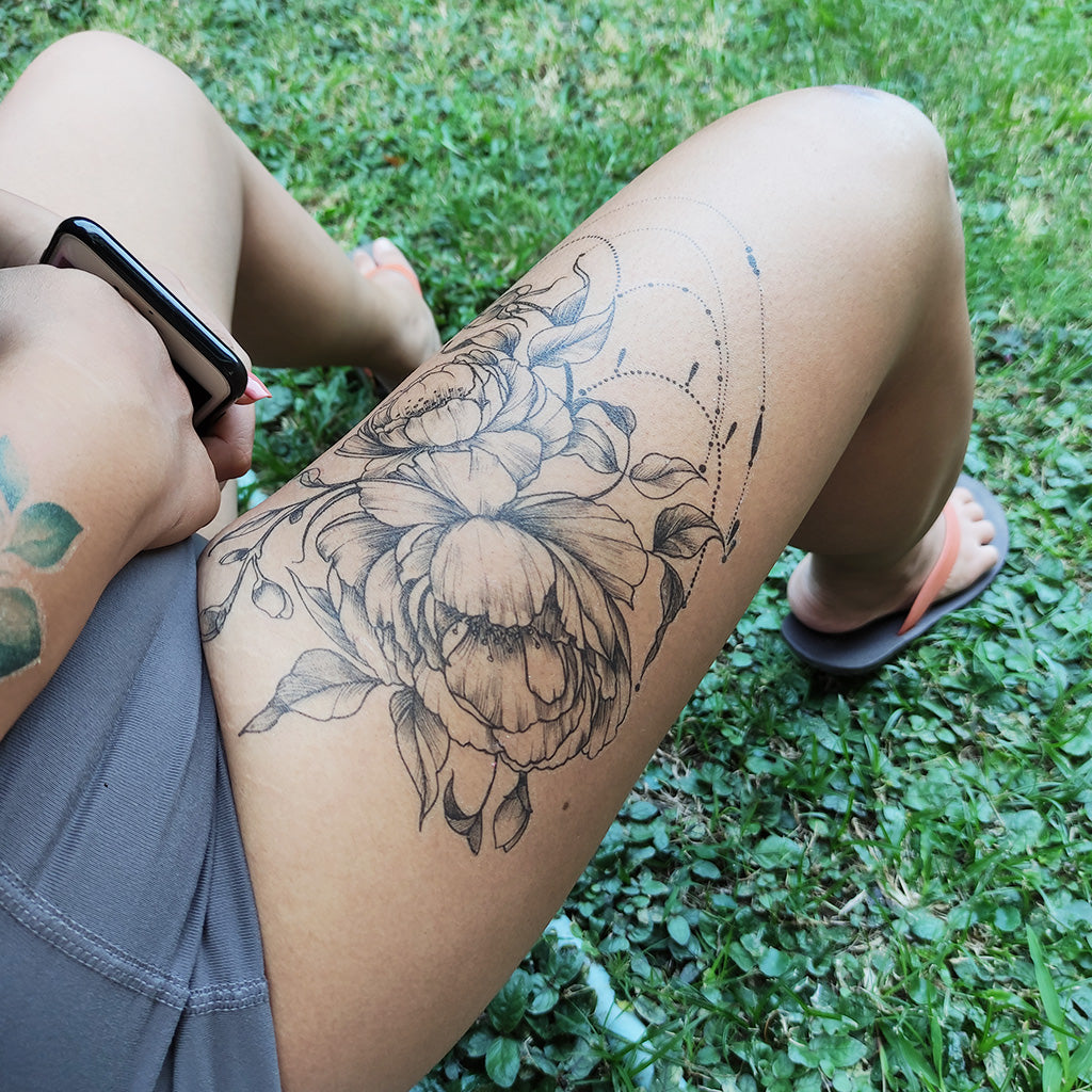 thigh chandelier tattoo