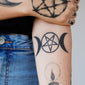 triple moon symbol tattoo